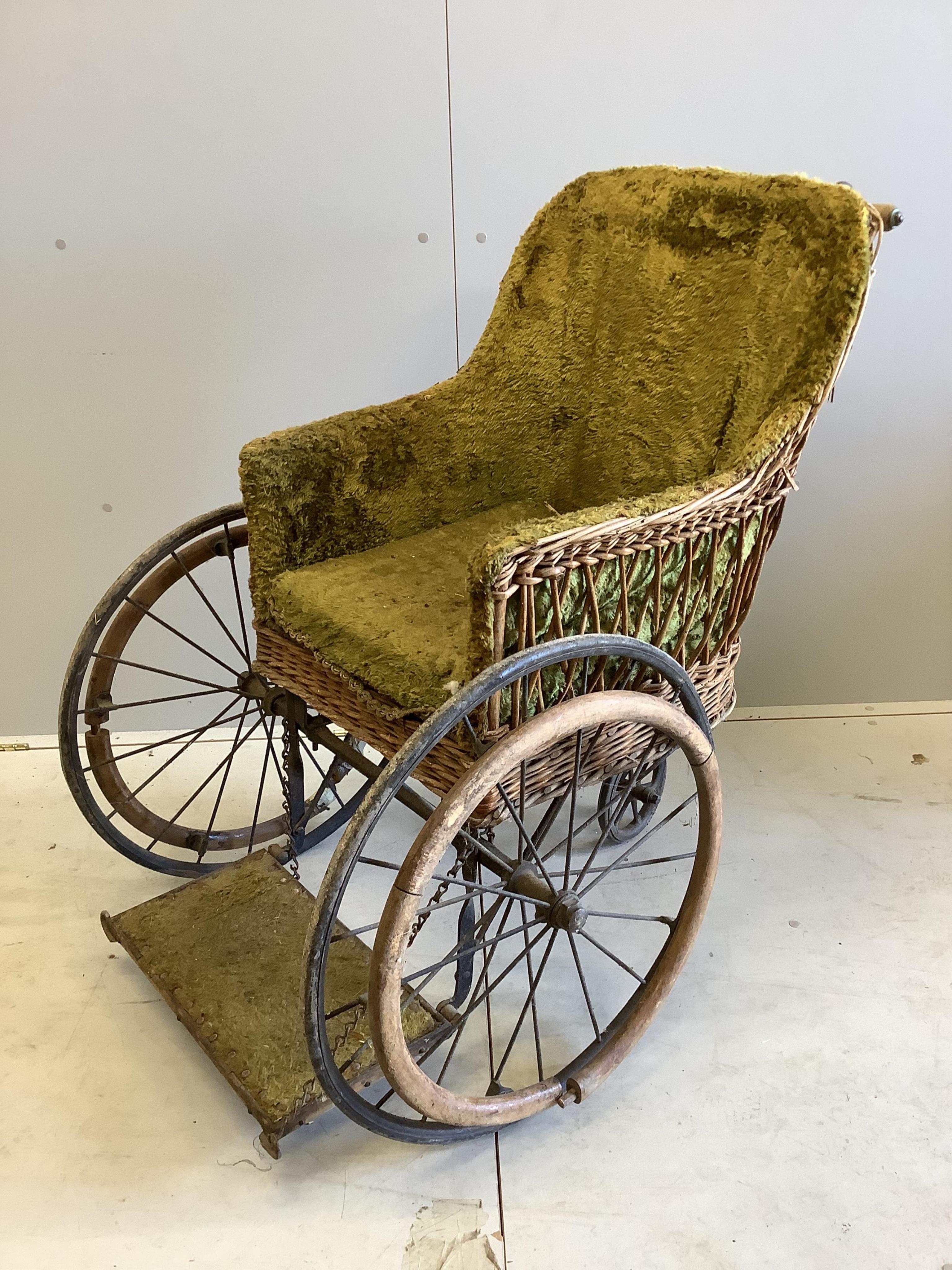 A late Victorian invalid's chair by Fry & Sons, height 100cm. Condition - fair